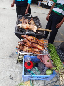 A specialty in Ecuador: grilled guinea pigs (Cuy)